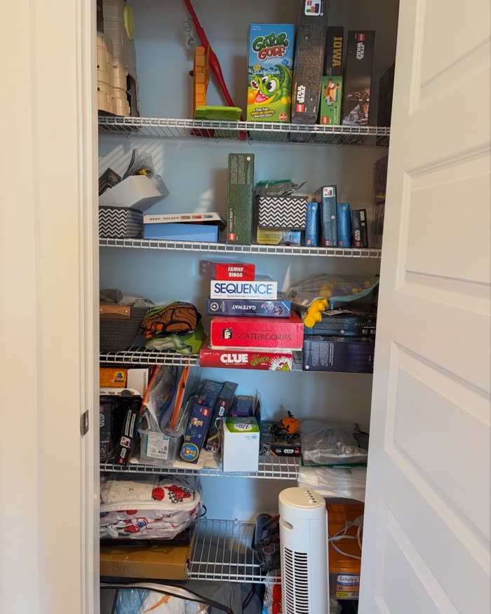 Playroom closet before organizing